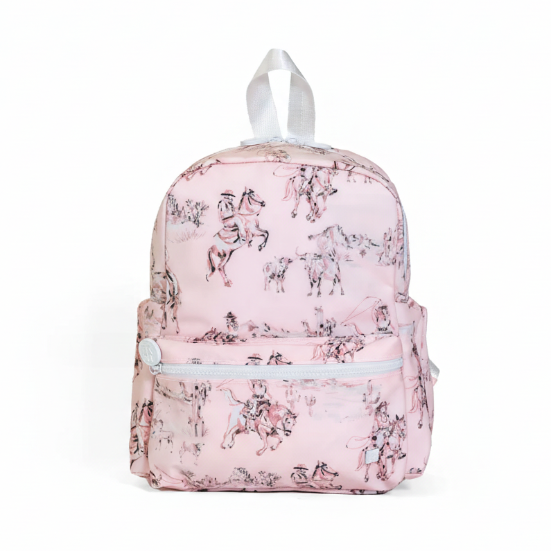 Pink backpack with horse print on a white background
